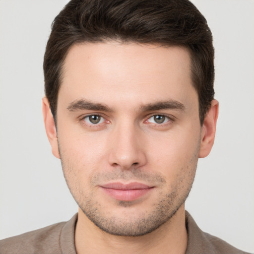 Neutral white young-adult male with short  brown hair and brown eyes