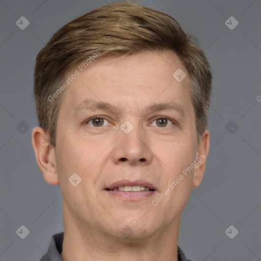 Joyful white adult male with short  brown hair and grey eyes