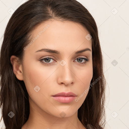 Neutral white young-adult female with long  brown hair and brown eyes