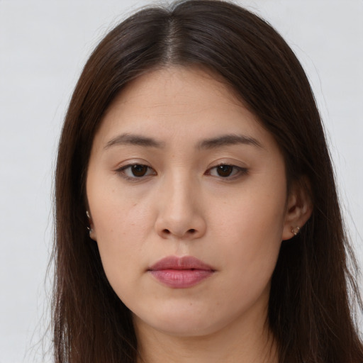 Neutral asian young-adult female with long  brown hair and brown eyes