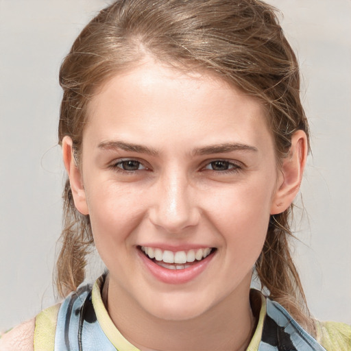 Joyful white young-adult female with medium  brown hair and blue eyes