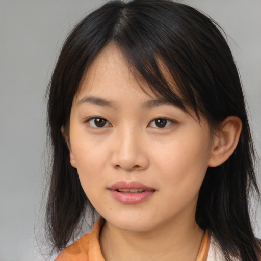 Neutral asian young-adult female with medium  brown hair and brown eyes