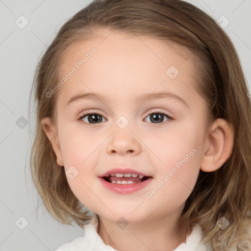 Joyful white child female with medium  brown hair and brown eyes