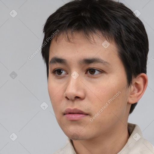 Neutral white young-adult male with short  black hair and brown eyes