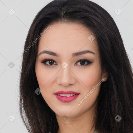 Joyful asian young-adult female with long  brown hair and brown eyes