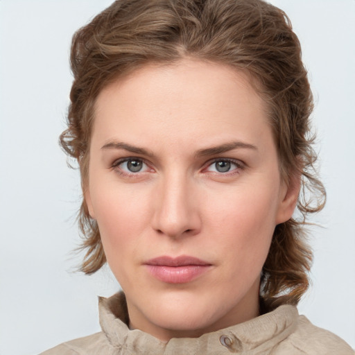 Neutral white young-adult female with medium  brown hair and blue eyes