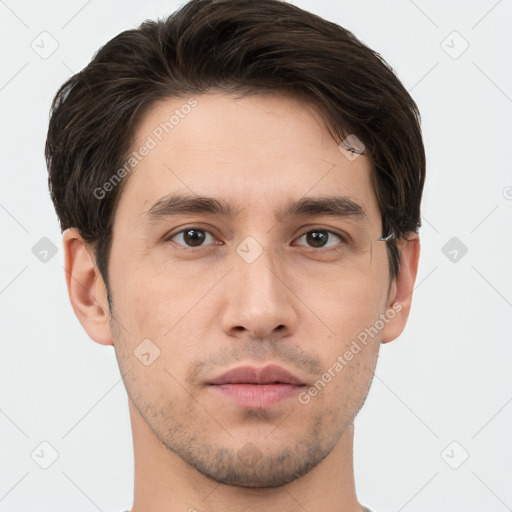 Neutral white young-adult male with short  brown hair and brown eyes