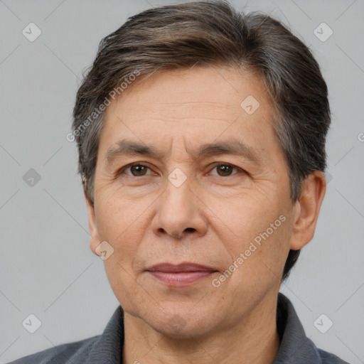 Joyful white middle-aged male with short  brown hair and brown eyes