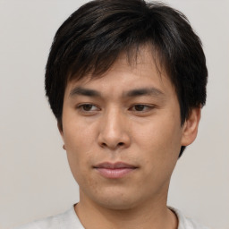 Neutral asian young-adult male with short  brown hair and brown eyes