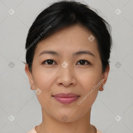 Joyful asian young-adult female with short  brown hair and brown eyes