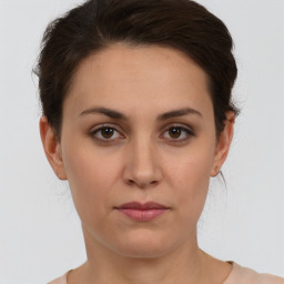 Neutral white young-adult female with short  brown hair and brown eyes