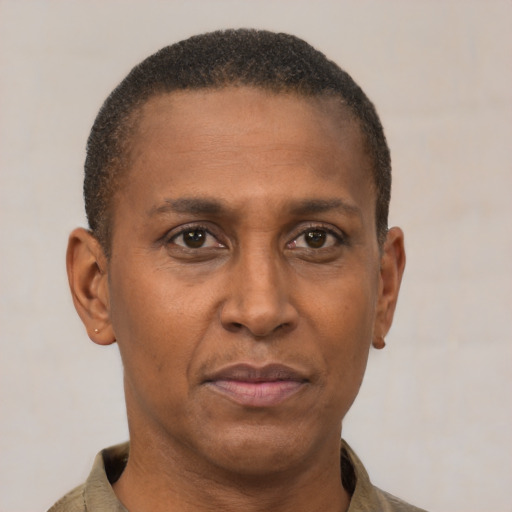Neutral latino adult male with short  brown hair and brown eyes