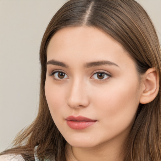 Neutral white young-adult female with long  brown hair and brown eyes