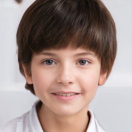 Joyful white child male with short  brown hair and brown eyes