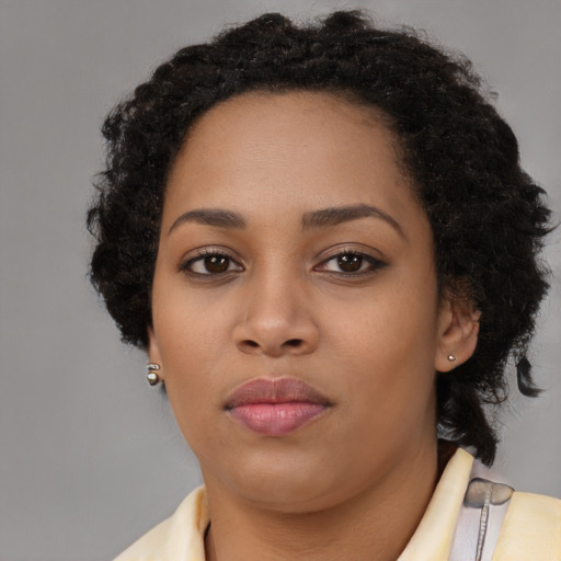 Neutral black young-adult female with long  black hair and brown eyes