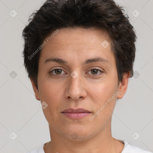 Joyful white adult female with short  brown hair and brown eyes