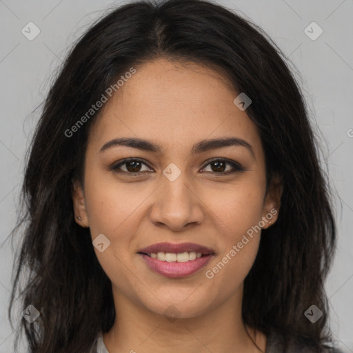 Joyful latino young-adult female with long  brown hair and brown eyes