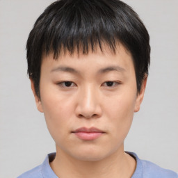 Neutral asian young-adult male with short  black hair and brown eyes