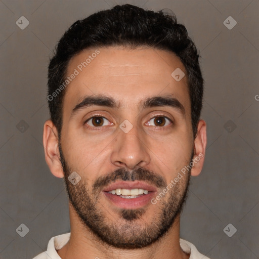 Joyful white young-adult male with short  black hair and brown eyes