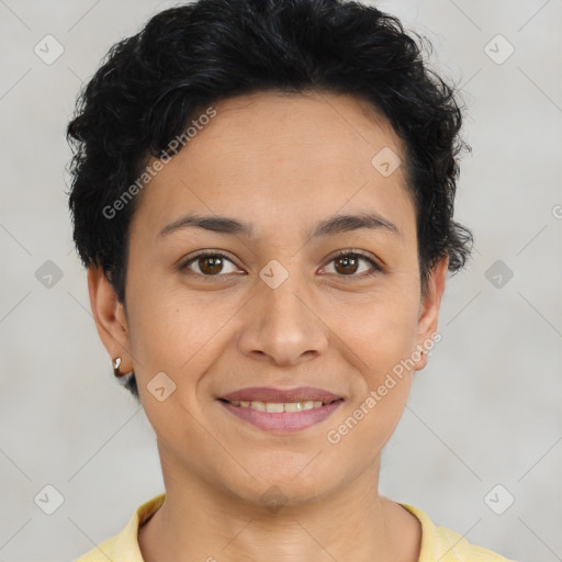 Joyful latino young-adult female with short  brown hair and brown eyes