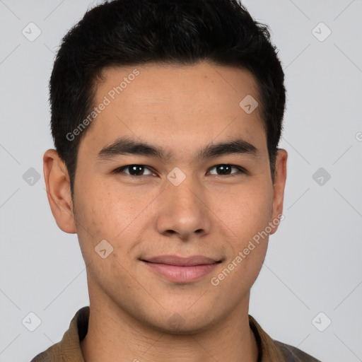 Joyful latino young-adult male with short  brown hair and brown eyes