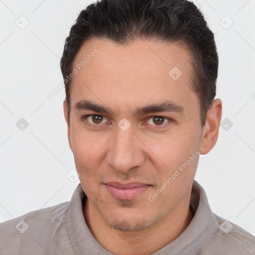 Joyful white adult male with short  brown hair and brown eyes