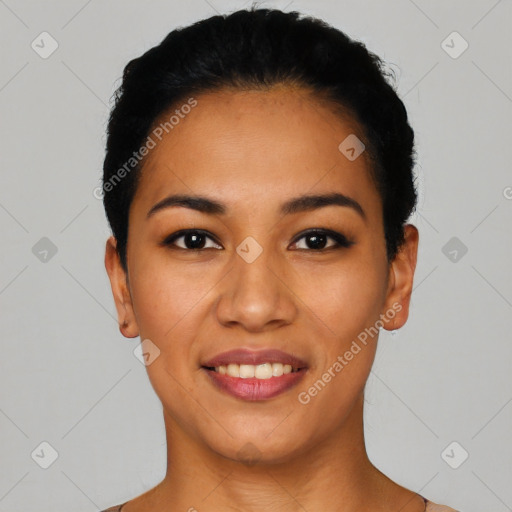 Joyful latino young-adult female with short  black hair and brown eyes