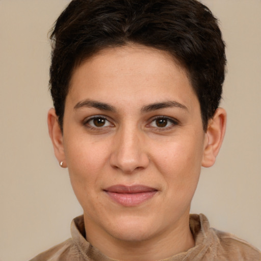 Joyful white young-adult female with short  brown hair and brown eyes