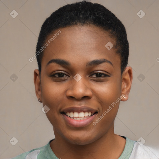 Joyful black young-adult female with short  black hair and brown eyes