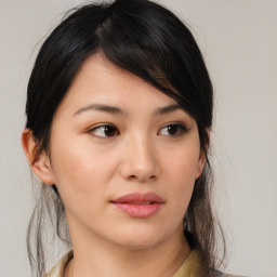 Neutral asian young-adult female with medium  brown hair and brown eyes