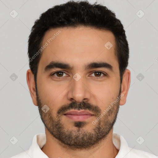 Joyful latino young-adult male with short  black hair and brown eyes