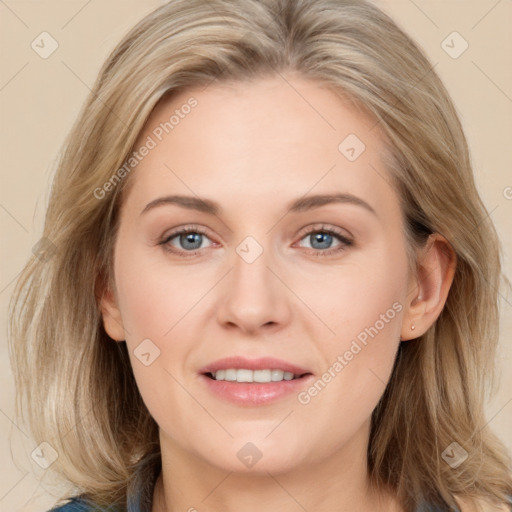 Joyful white young-adult female with medium  brown hair and blue eyes