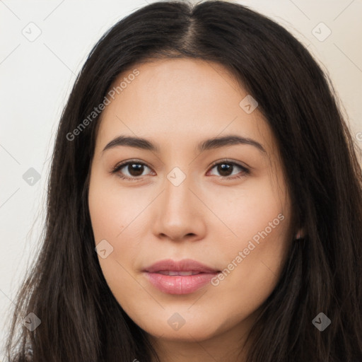 Joyful latino young-adult female with long  brown hair and brown eyes