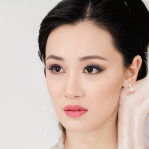 Neutral white young-adult female with medium  black hair and brown eyes
