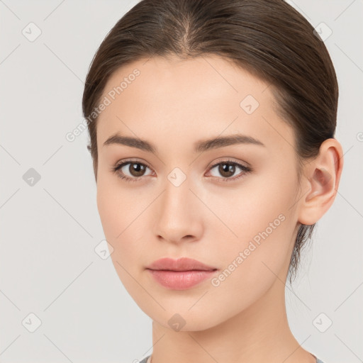 Neutral white young-adult female with medium  brown hair and brown eyes