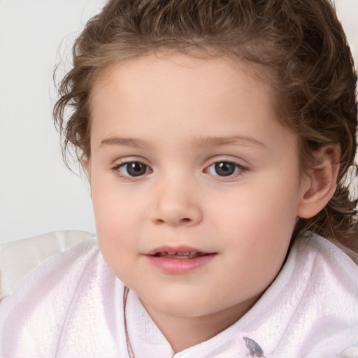 Joyful white child female with short  brown hair and brown eyes