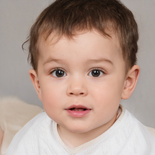 Neutral white child male with short  brown hair and brown eyes