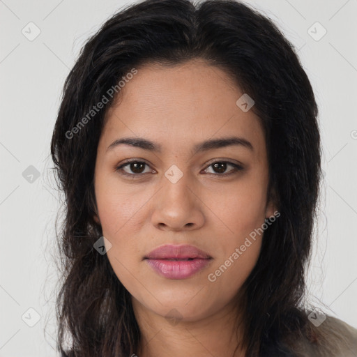 Joyful latino young-adult female with long  brown hair and brown eyes