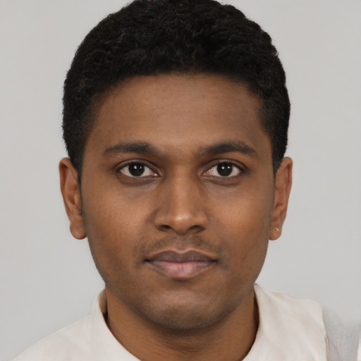 Neutral black young-adult male with short  black hair and brown eyes