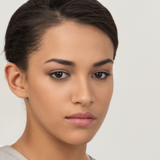 Neutral white young-adult female with short  brown hair and brown eyes