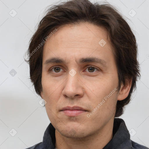 Neutral white adult male with short  brown hair and brown eyes