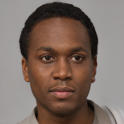 Neutral black young-adult male with short  brown hair and brown eyes