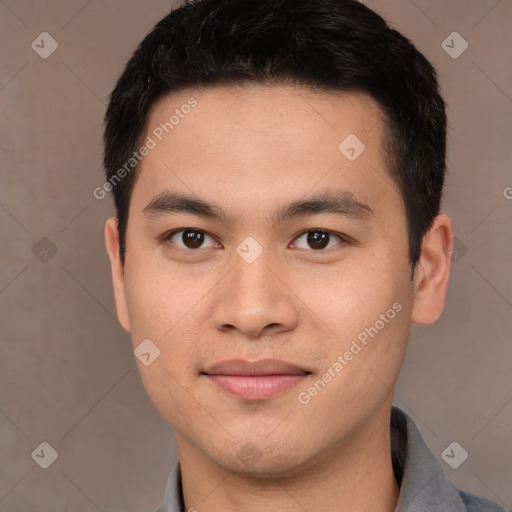 Joyful white young-adult male with short  black hair and brown eyes