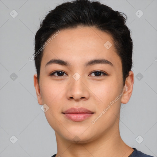 Joyful asian young-adult female with short  brown hair and brown eyes