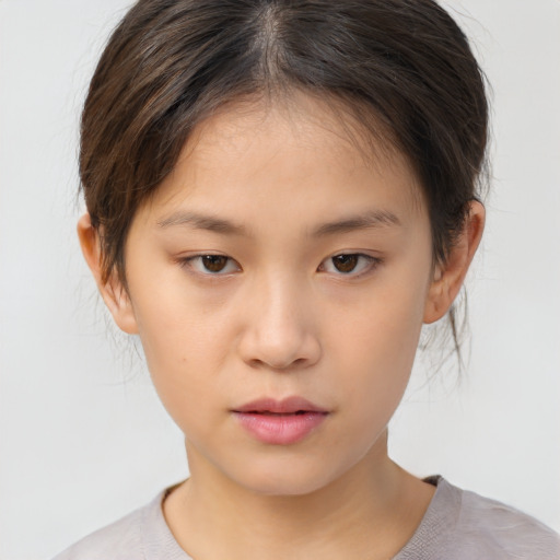 Neutral asian child female with medium  brown hair and brown eyes