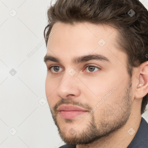 Neutral white young-adult male with short  brown hair and brown eyes