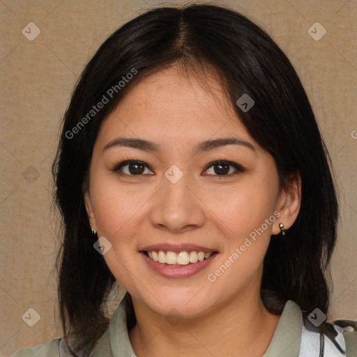 Joyful latino young-adult female with medium  brown hair and brown eyes