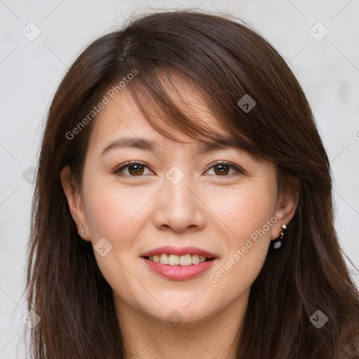 Joyful white young-adult female with long  brown hair and brown eyes