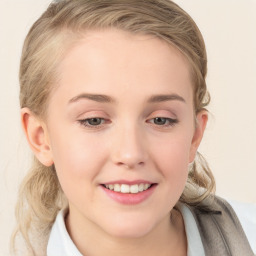 Joyful white young-adult female with medium  brown hair and blue eyes