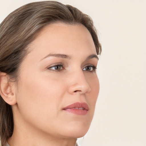 Neutral white young-adult female with medium  brown hair and brown eyes